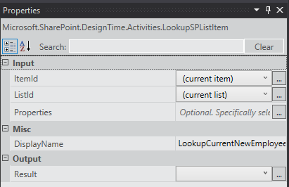 The Properties pane of the Lookup List Item workflow activity with ItemID, ListID, and DisplayName properties set