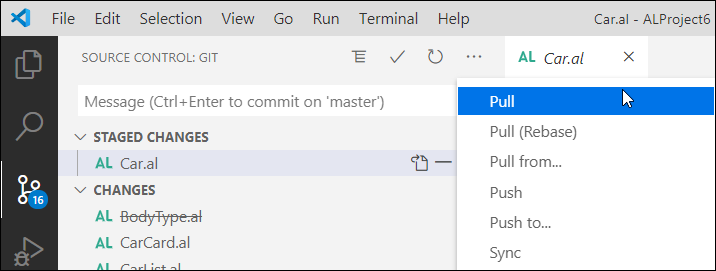 Screenshot of the SCM command menu with push, pull and sync options.