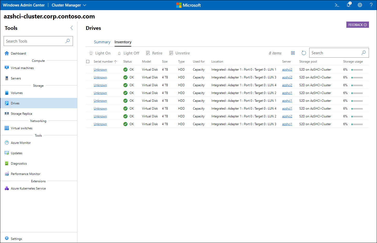 The screenshot depicts the Windows Admin Center interface displaying the list of disks with the online status labeled OK.