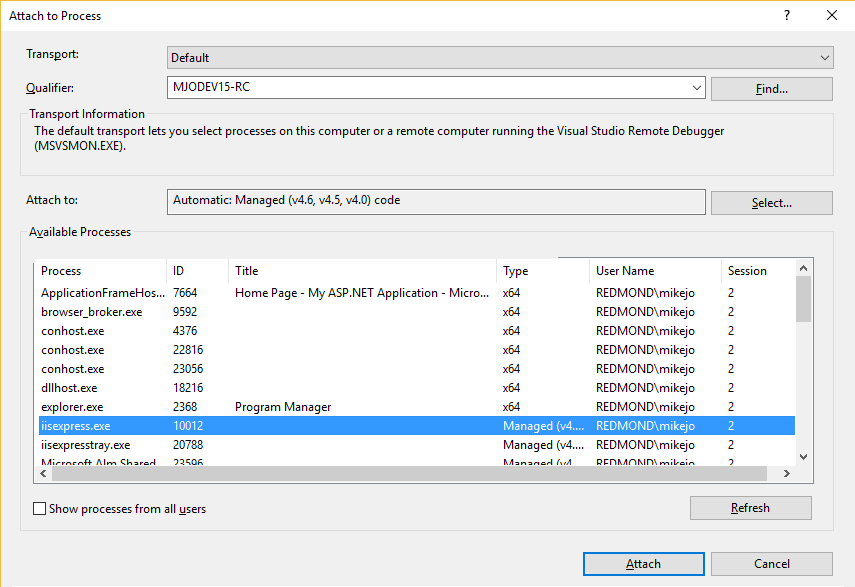 Screenshot of the Attach to Process dialog box, with the connection target set to the local machine name.