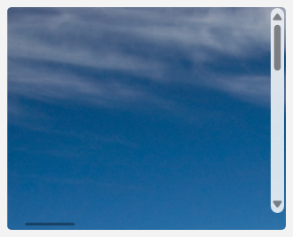 到目前為止，一幅放大的山圖片，只有圖片左上方的藍天和雲層可見。